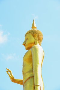 Low angle view of statue against sky