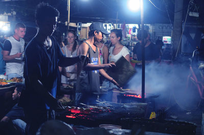 People sitting in kitchen