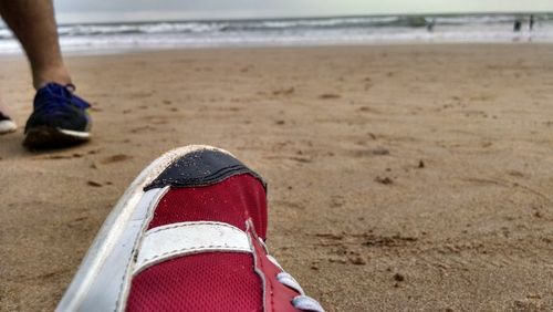 Low section of people on beach