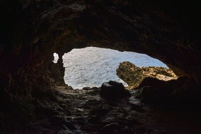 High angle view of rock formation in sea