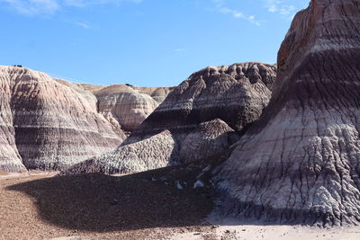 Rock formations on mountain against sky