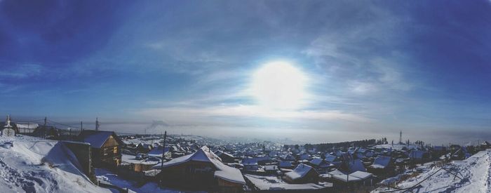 Scenic view of landscape against cloudy sky