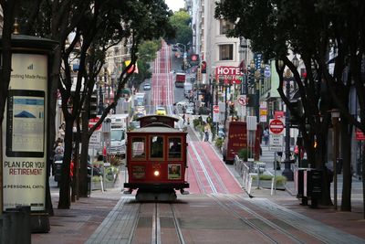 Tram on street in city