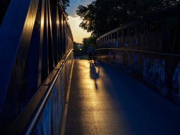 Silhouette of bridge against sky at sunset