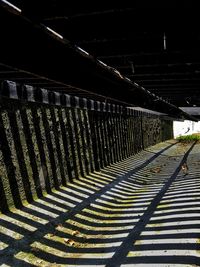 Shadow of fence on roof