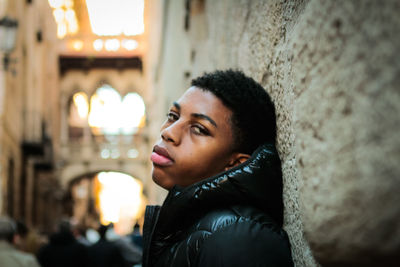 Portrait of young man looking away