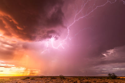 Lightning in sky during sunset