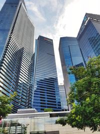 Low angle view of skyscrapers against sky