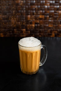 Close-up of coffee cup on table