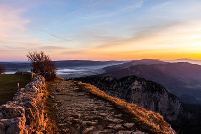 Scenic view of mountains against sky during sunset