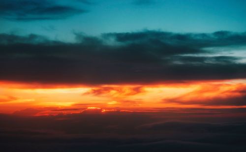 Scenic view of dramatic sky during sunset