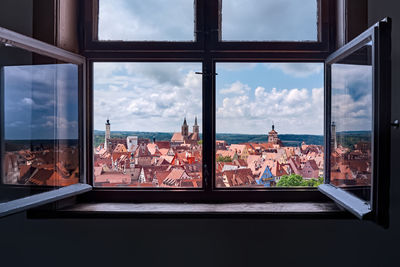 Cityscape seen through glass window