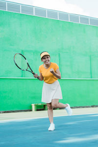 Young man playing tennis