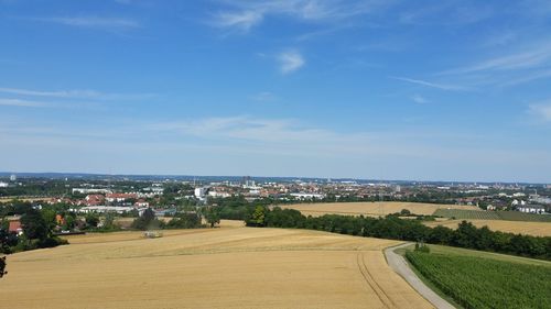 High angle shot of cityscape against sky