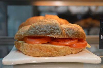 Close-up of sandwich served in plate on table