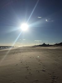 Scenic view of beach during sunny day