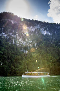 Scenic view of river in forest against sky