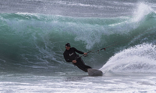 People surfing in sea