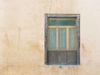 Full frame shot of window on wall