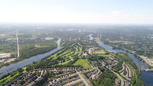 High angle view of river amidst buildings in city