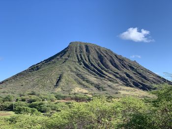 Scenic view of mountain against clear blue sky