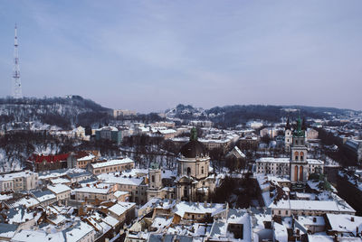 High angle view of townscape against sky during winter