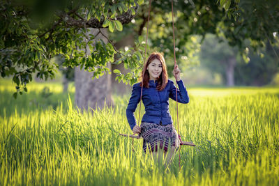 Full length of woman on field