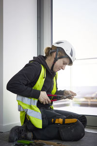 Side view of man working in gym