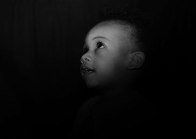 Portrait of young woman looking away