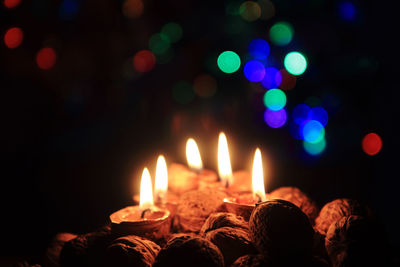 Close-up of burning candles