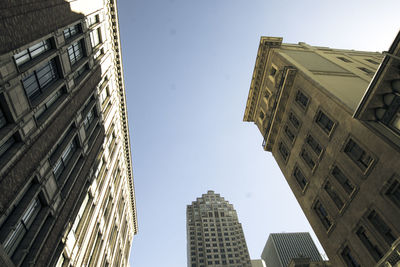 Low angle view of buildings against clear sky