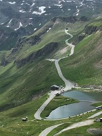 High angle view of winding road on land