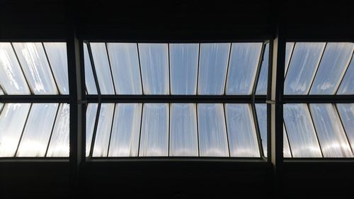 Low angle view of glass window