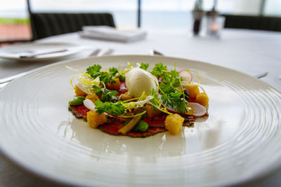 Close-up of food in plate on table