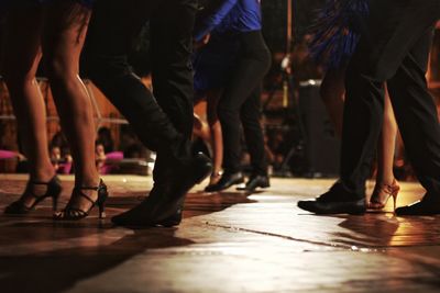 Low section of people dancing at nightclub