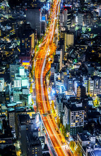 High angle view of illuminated cityscape at night