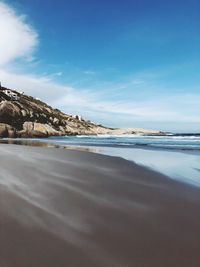 Scenic view of beach against sky