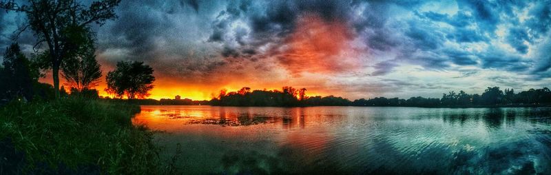 Scenic view of lake at sunset