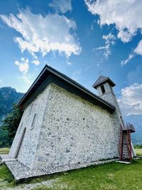 Low angle view of old building against sky