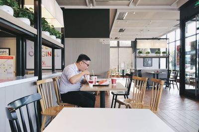 Man sitting on table