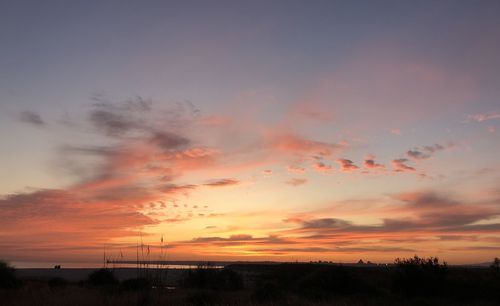 Scenic view of dramatic sky during sunset