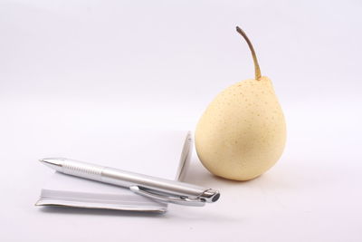 Close-up of apple against white background