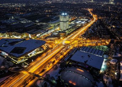 High angle view of illuminated city at night