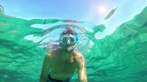 Man swimming in sea