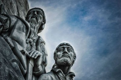 Low angle view of statue against sky