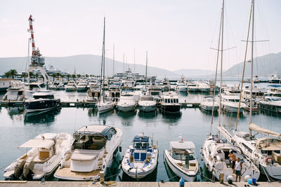 Boats moored at harbor