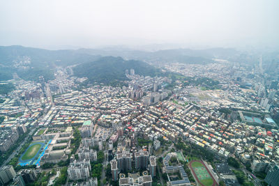 High angle shot of townscape against sky