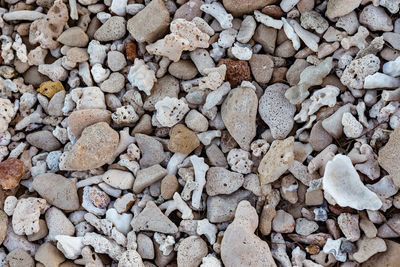 High angle view of stones on pebbles