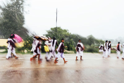 Group of people playing outdoors