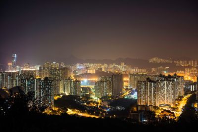 Illuminated cityscape at night